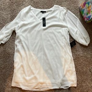 White long shelve dress with tags still on